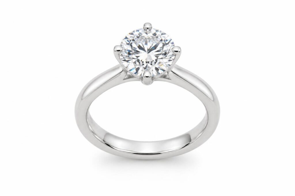 Solitaire ring with a round brilliant diamond held by four evenly spaced claws
